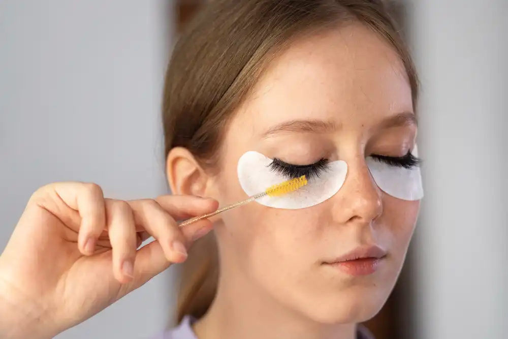 Profile view of a woman with under-eye patches, focusing on eye care
